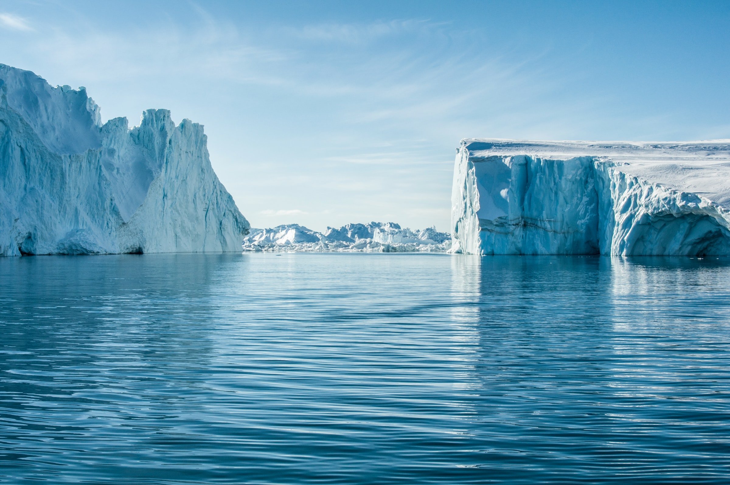Photos of icebergs in the water.