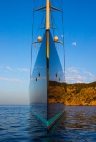 Photo of a see through yacht in water.