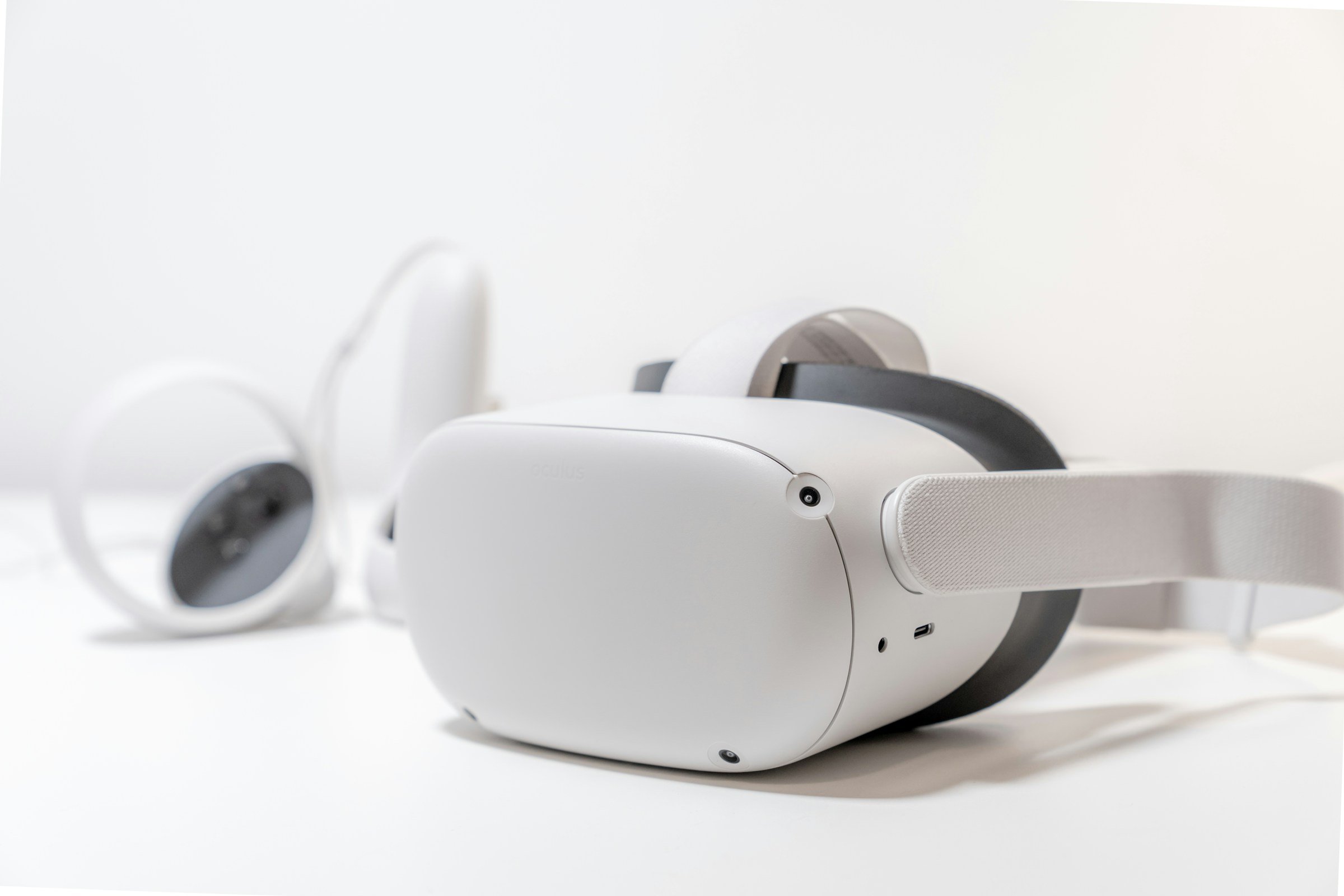 A white Oculus Meta Quest Virtual Reality headset