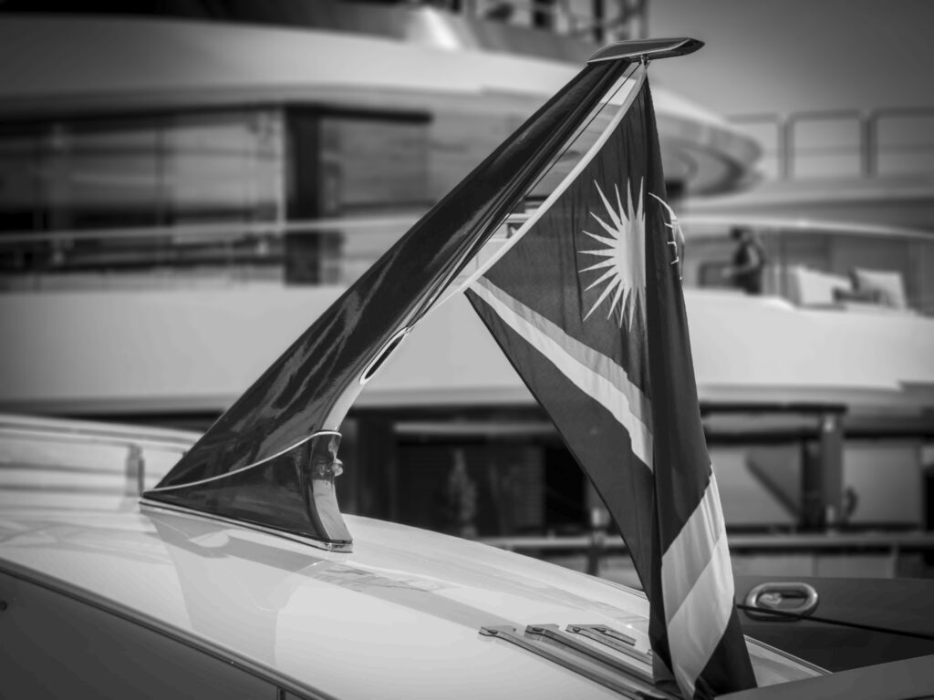 Marshall Islands flag on high-tech superyacht flagpole